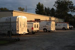 QSC trucks and shop.