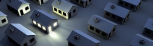 3D rendering of mulitple houses; only one has lights on.