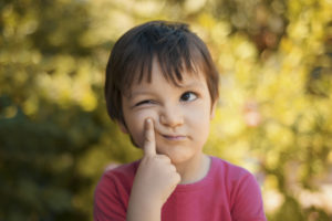 little boy looking confused wondering if getting HVAC preventative maintenance is worth it