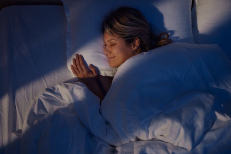 Image of someone sleeping. Your HVAC System Can Enhance Sleep.